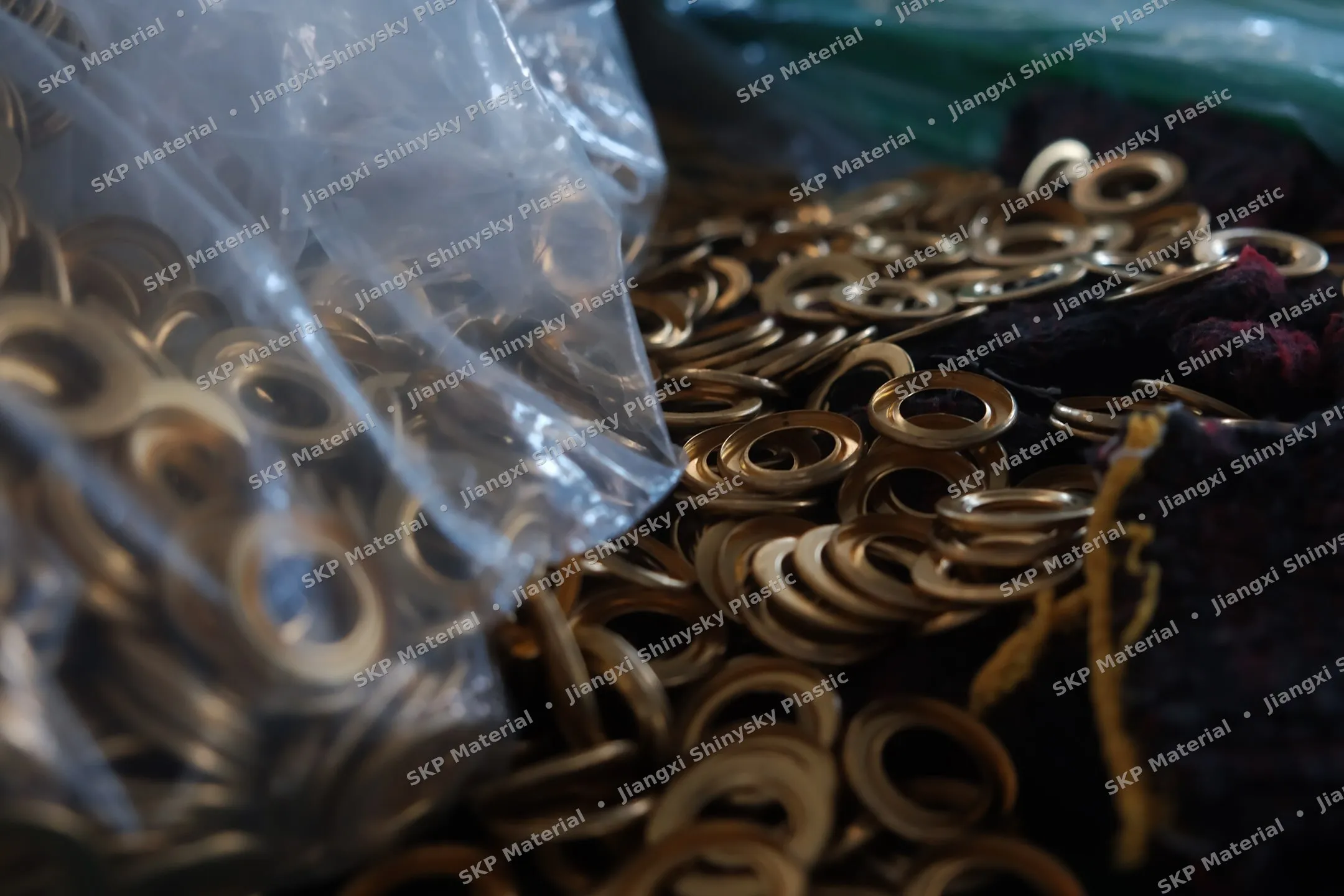 Brass grommets close-up — SKP curtain hardware