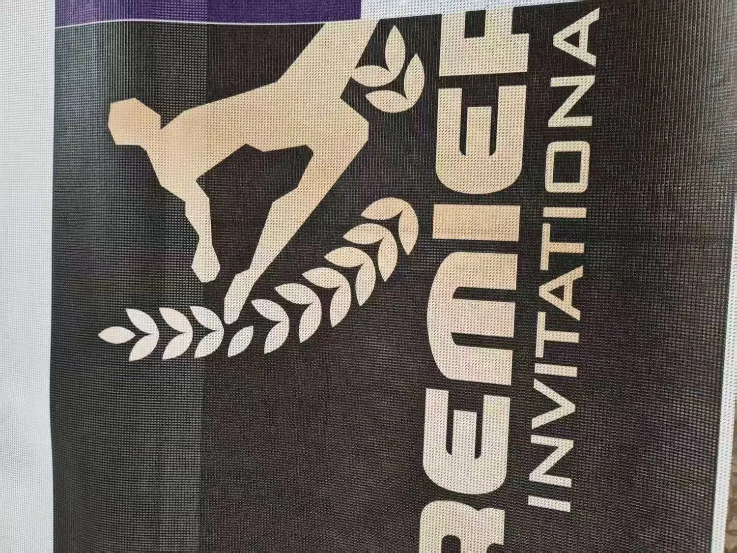 Printed soccer mesh banner produced for a football league showing club artwork on perforated mesh