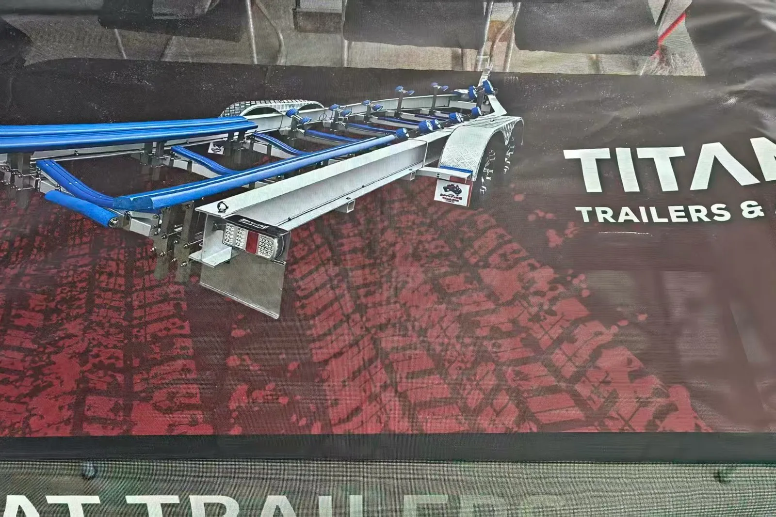 Close-up of a UV-printed vehicle graphic on 320 gsm PVC mesh banner material